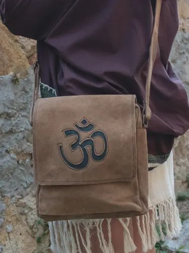 Om suede crossbody bag